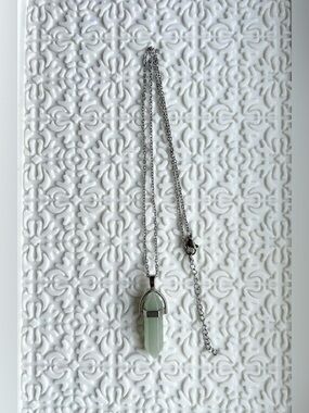 NWOT Pendant Necklace with Silver-Tone Chain and a Light Faceted Green Stone